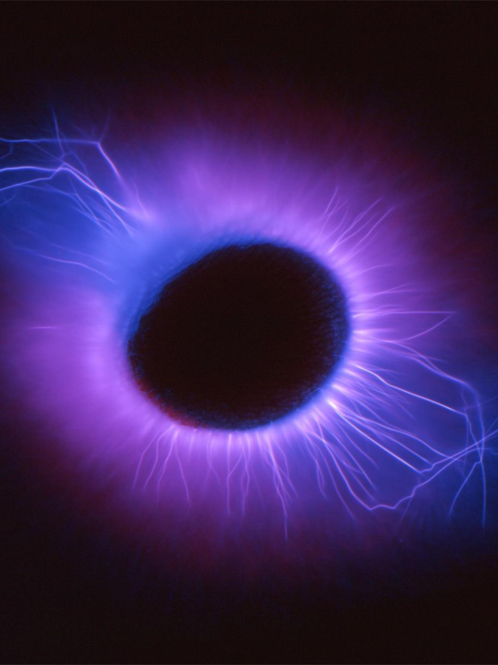 Kirlian-Farbfotografie einer Fingerkuppe.